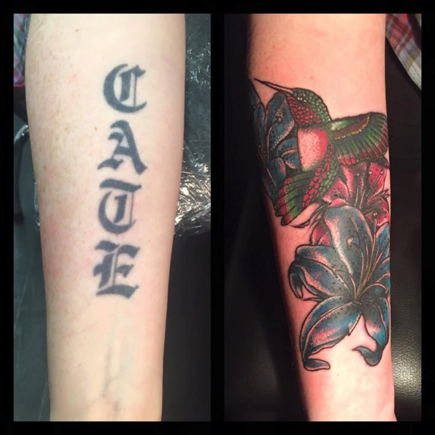 A tattoo cover up , covering oldenglish tattoo lettering with