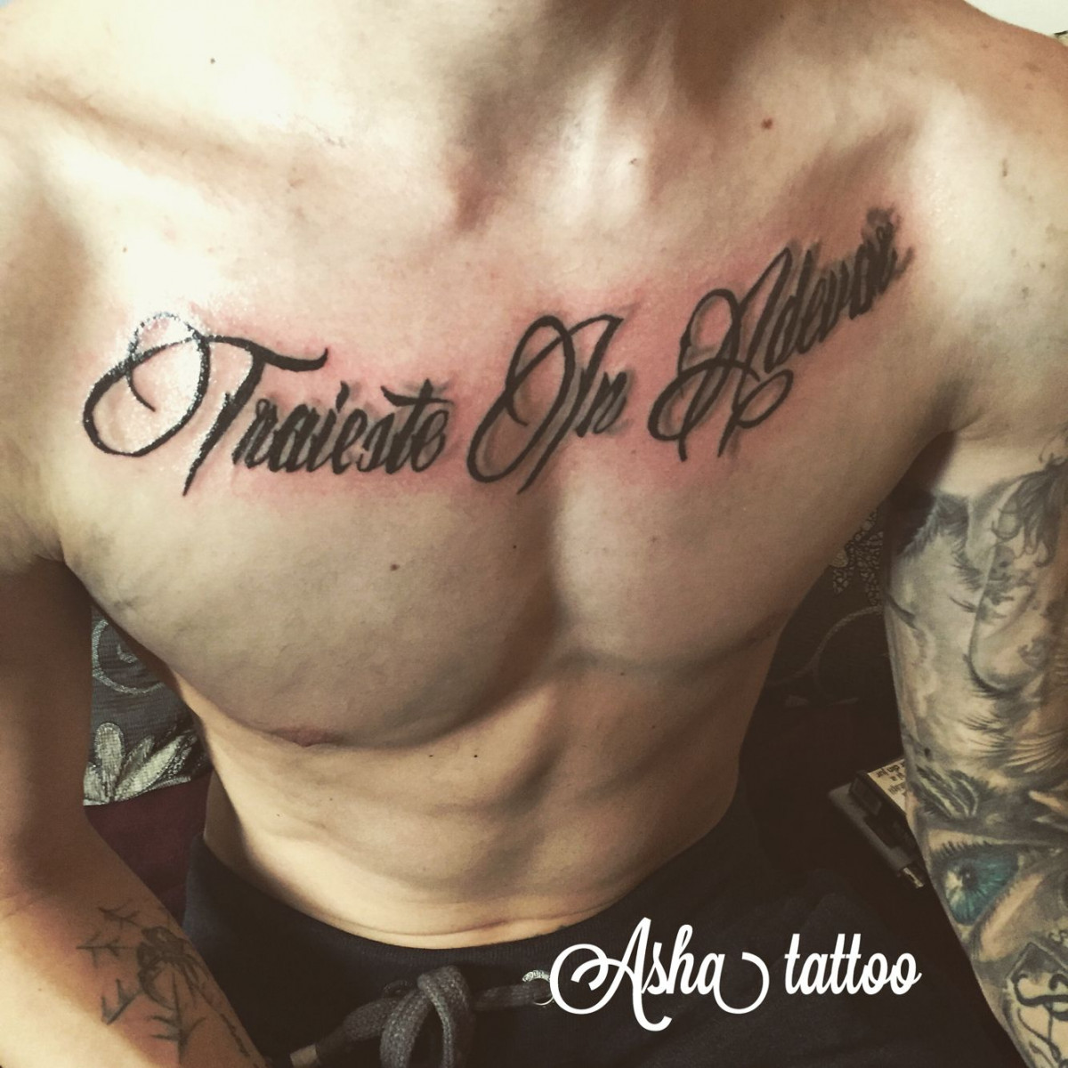 Chest tattoo  Strength tattoo, Knuckle tattoos, Small chest tattoos