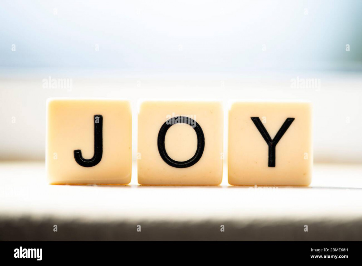 Joy in block letters Stock Photo - Alamy